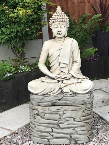 Buddha Praying On Rock - image 1