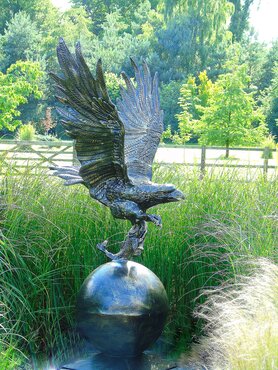 Statue Eagle On Ball